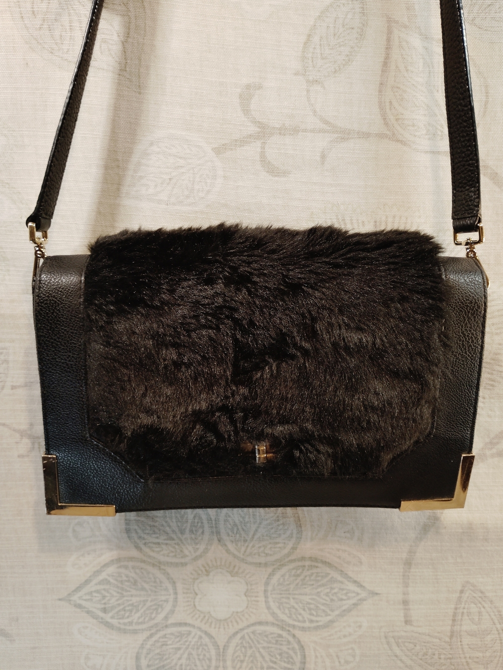 Black Faux Fur Accent Crossbody Bag with Gold Tone Trim